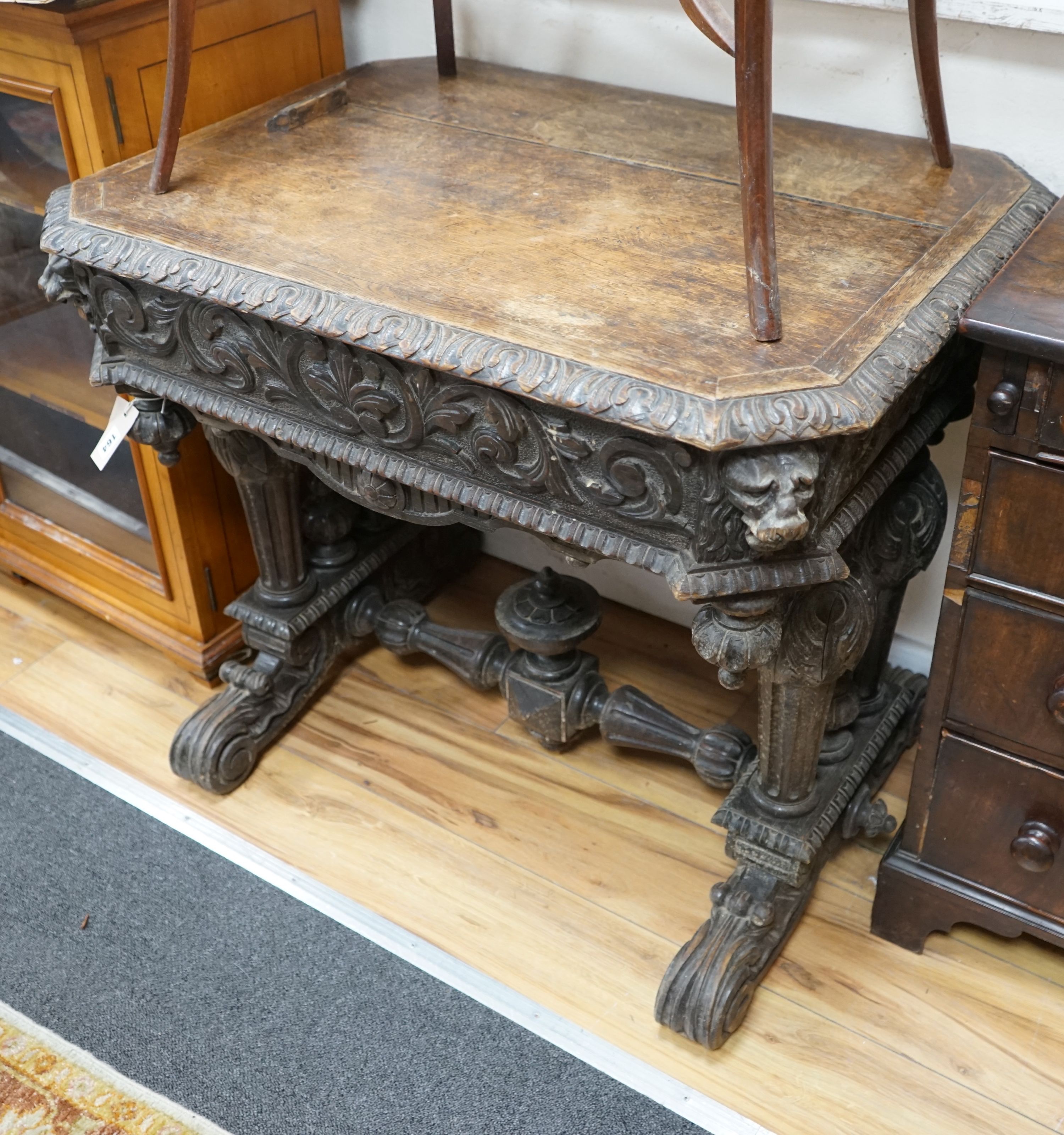 A late 19th century Flemish octagonal carved oak centre table, width 80cm, depth 60cm, height 72cm